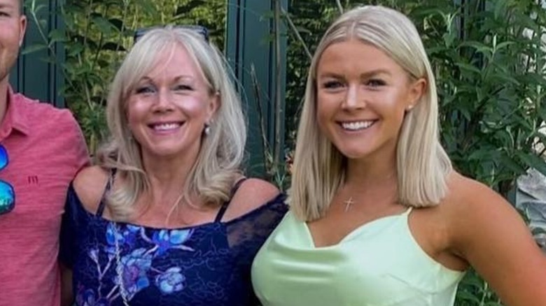 Karoline Leavitt posing with her family with heavy highlighter