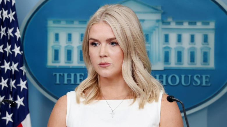 Karoline Leavitt with a neutral expression