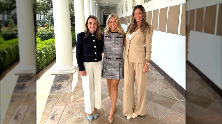Karoline Leavitt at the White House with two other women