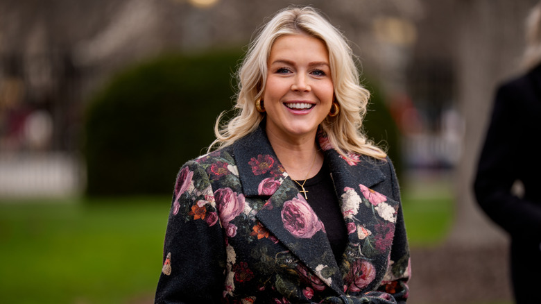 Karoline Leavitt smiles during a TV interview in 2026