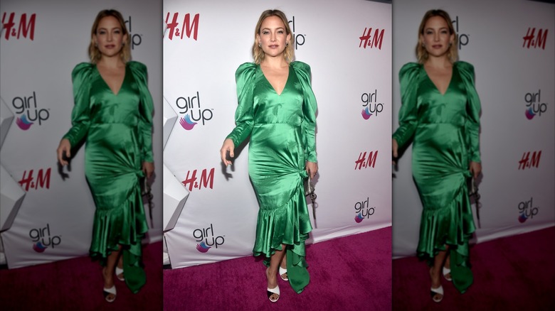 Kate Hudson in a satin, green dress