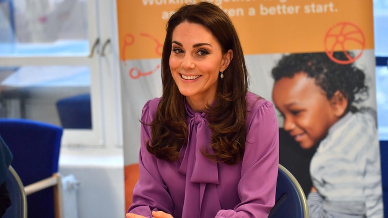 Kate Middleton wearing a Gucci blouse