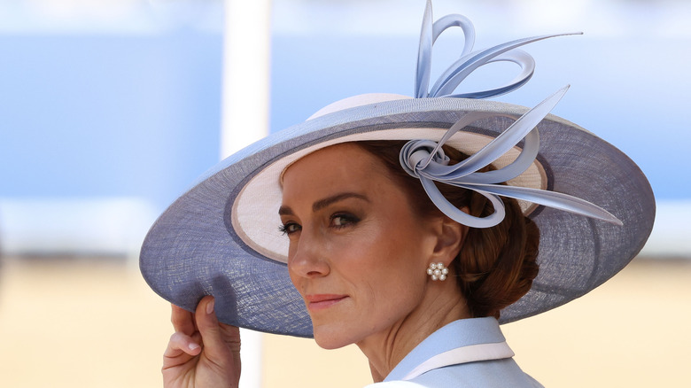 The Princess of Wales wearing a blue broad brim hat