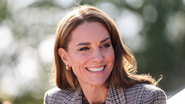A close-up photo of a smiling Kate Middleton