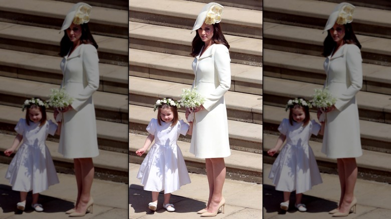 Catherine, Princess of Wales, with Princess Charlotte, at Prince Harry and Meghan Markle's wedding