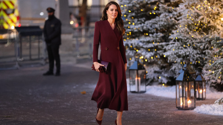 Kate Middleton in a maroon coat