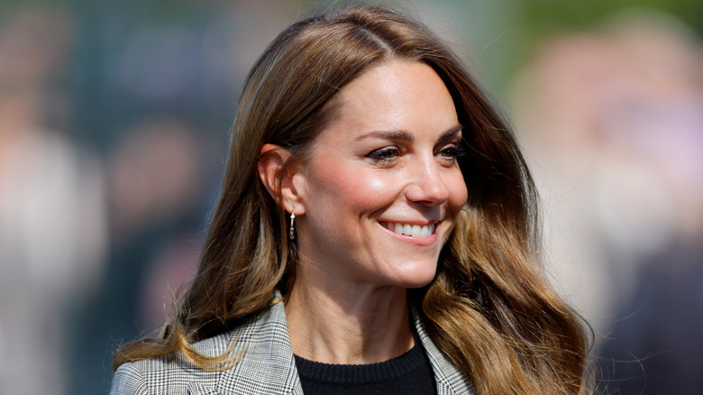 Kate Middleton smiling in daylight