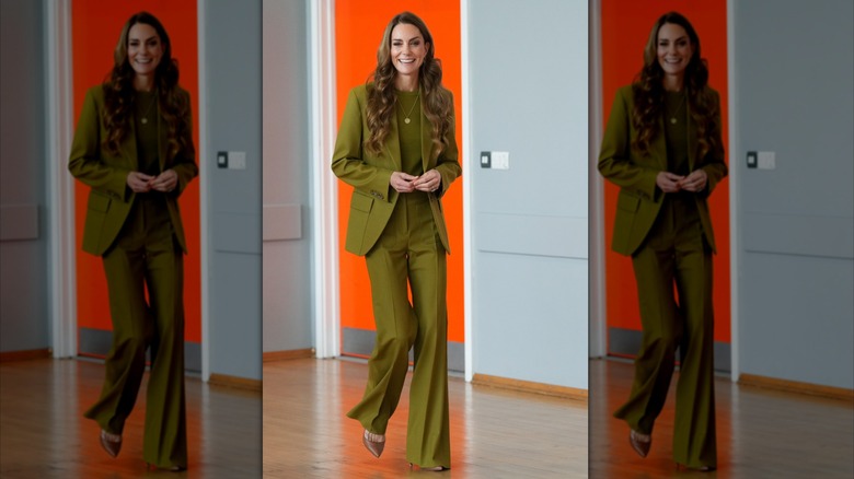 Kate Middleton in a green pantsuit at an event