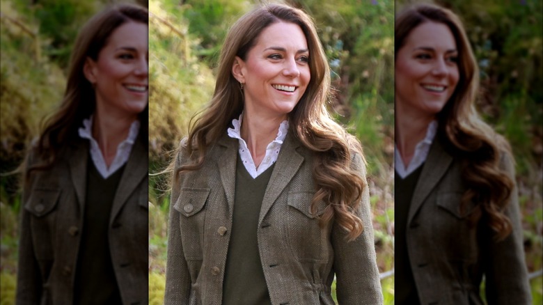 Kate Middleton laughing while being photographed with bouncy curls in April 2025