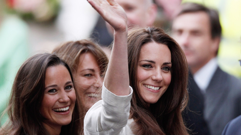 Kate and Pippa Middleton pictured smiling in 2011