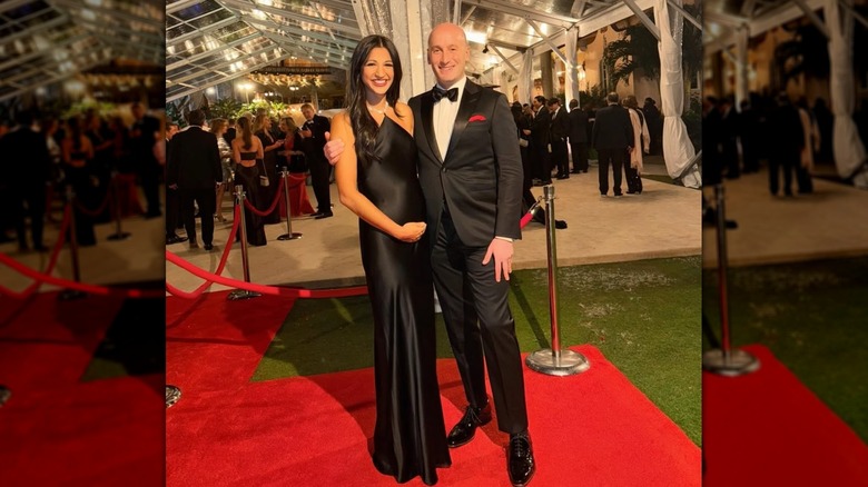 Katie Miller and Stephen Miller smiling together in black tie at an event at Mar-a-Lago