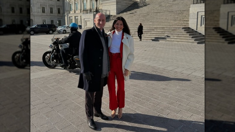 Katie Miller posing outside the White House with her husband
