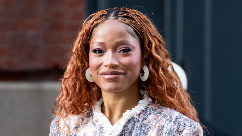 Keke Palmer pictured smiling outside in 2026