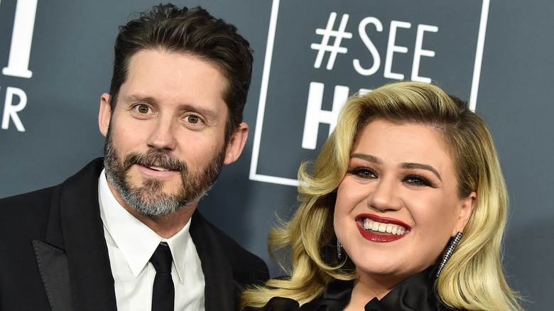 Kelly Clarkson on the red carpet with husband Brandon Blackstock