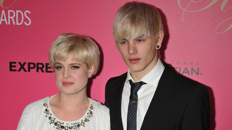 Kelly Osbourne posing with Luke Worrall at the Style Awards in 2009