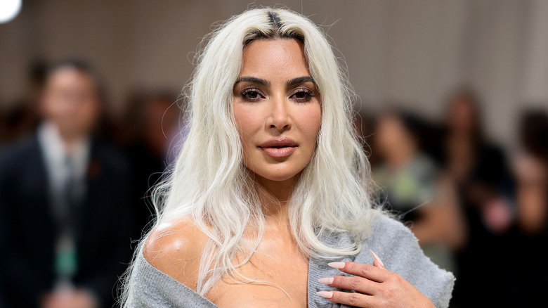 Kim Kardashian in a grey sweater at the Met Gala