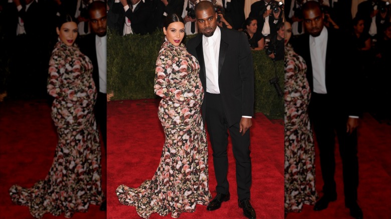 Kim Kardashian in a flower dress on the red carpet with Kanye West in a tuxedo