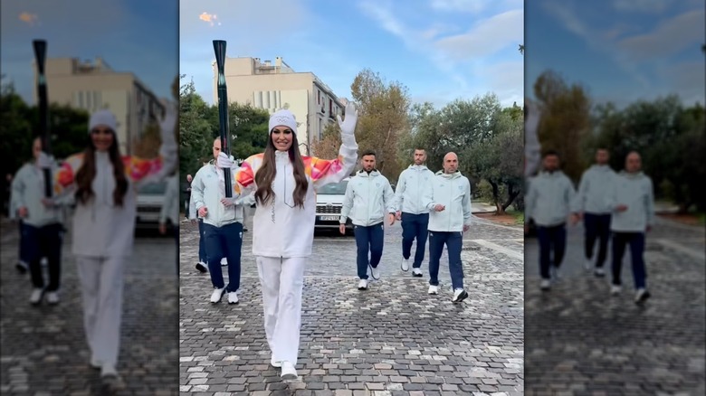 Kimberly Guilfoyle carrying an Olympic torch in Greece.