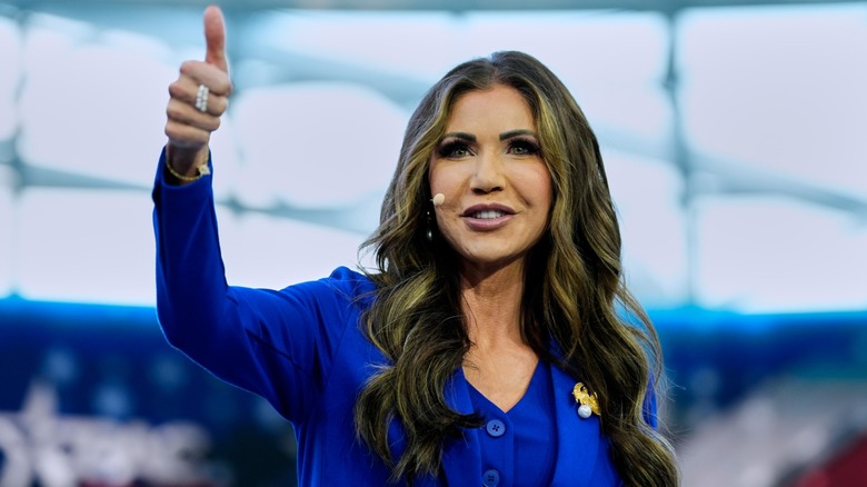 Kristi Noem giving a thumbs up