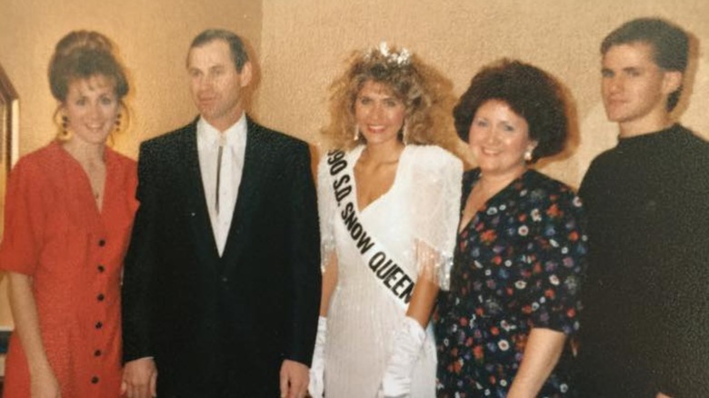 Kristi Noem posing as Snow Queen in 1990 with blond hair