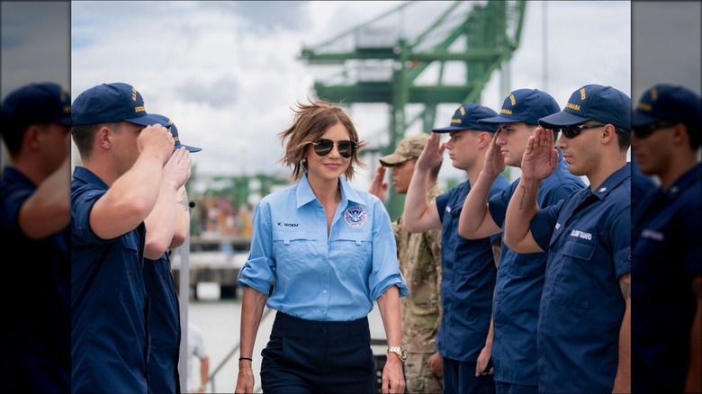 Kristi Noem in aviators while visiting the coast guard