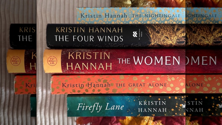 The spines of multiple books by Kristin Hannah