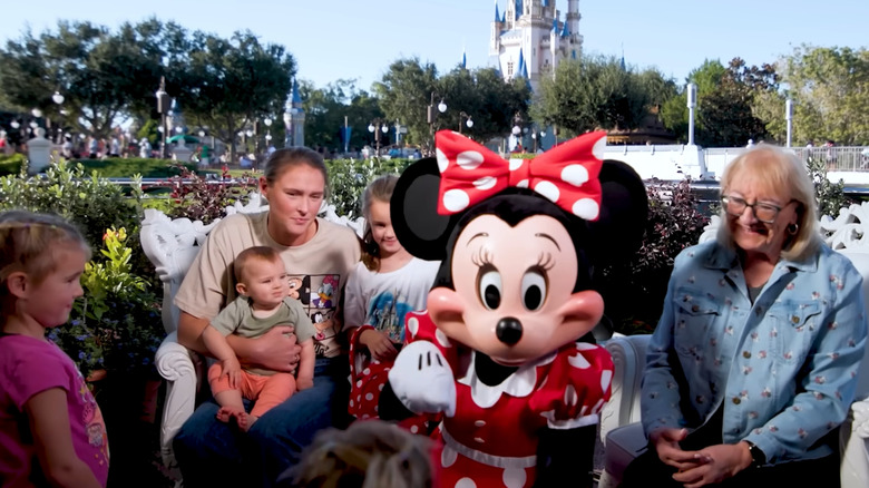 Kylie and Donna Kelce with kids and Minnie Mouse