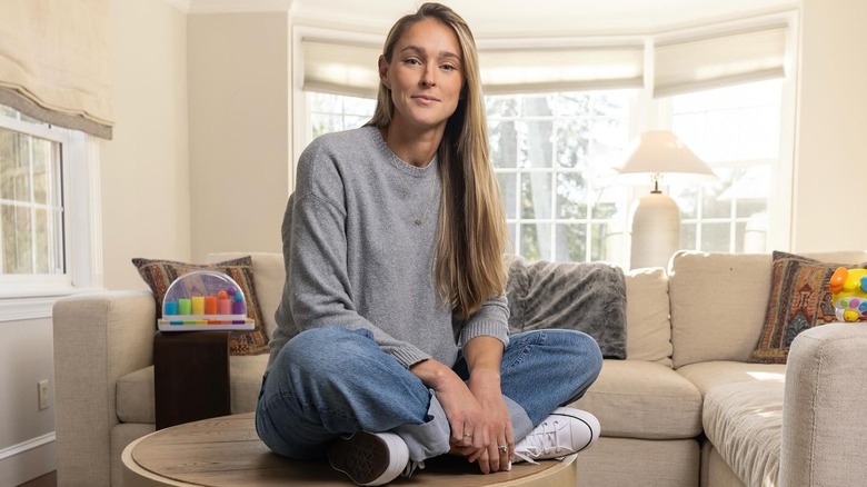 Kylie Kelce sitting on a table