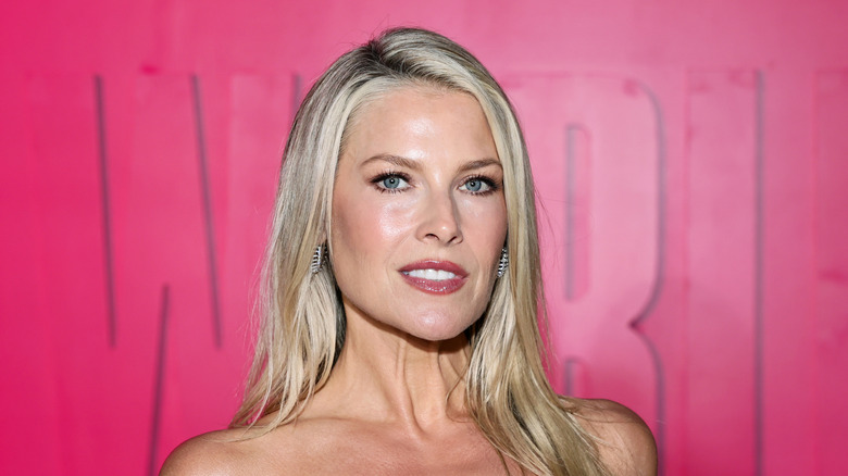 Ali Larter wearing small diamond earrings and light makeup