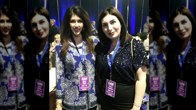 Laura Loomer and Dr. Maya Puri posing for a photo