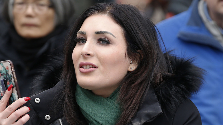 Laura Loomer protesting