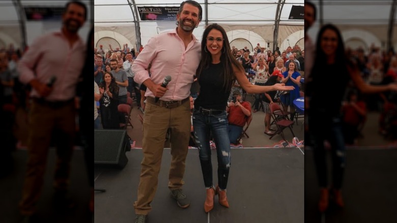 Lauren Boebert in ripped jeans posing with Donald Trump Jr.