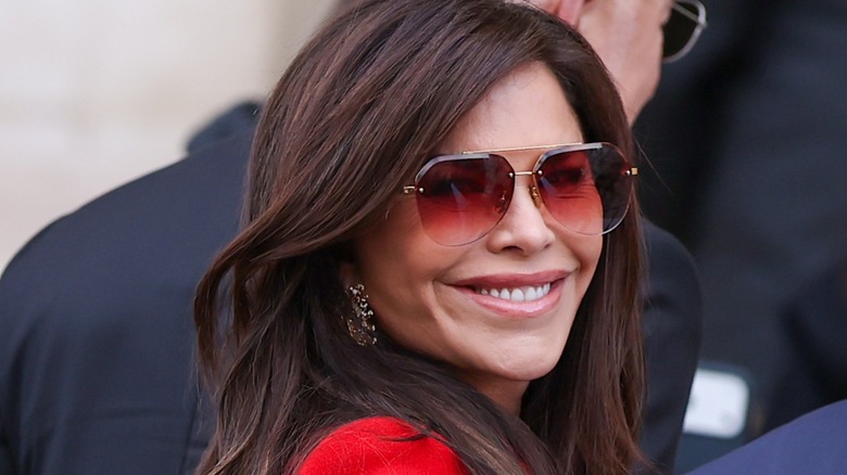 Lauren Sánchez Bezos smiling over her shoulder