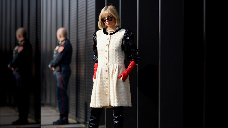 A woman in red gloves 
