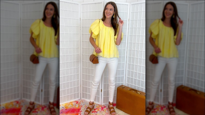 Woman wearing white denim with sandals