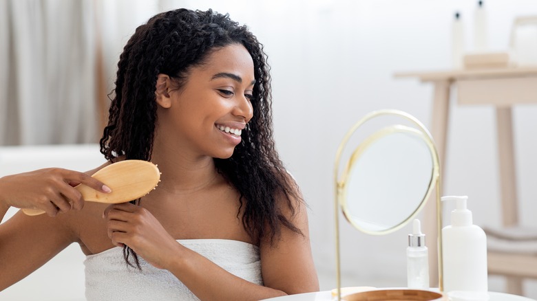 Woman brushing her hair