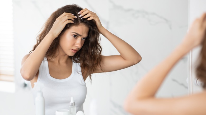 Woman messing with her hair