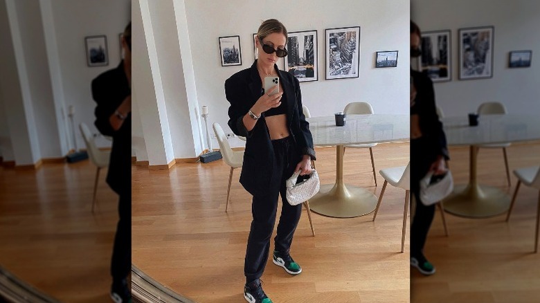 Woman in sweats and blazer