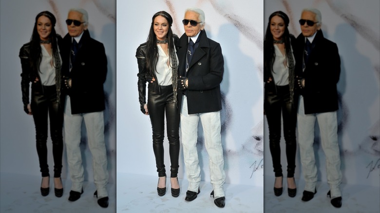 Lindsay Lohan standing next t Karl Lagerfeld