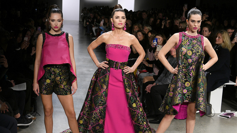 Delilah Hamlin, Lisa Rinna, and Amelia Hamlin wear coordinated pink dresses