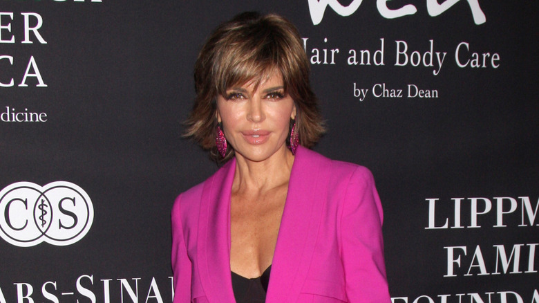 Lisa Rinna with bobbed hair and a hot pink suit
