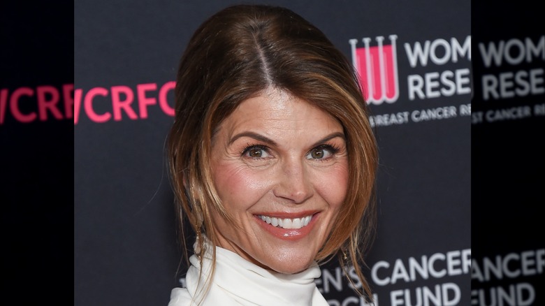 Lori Loughlin wearing a white turtleneck