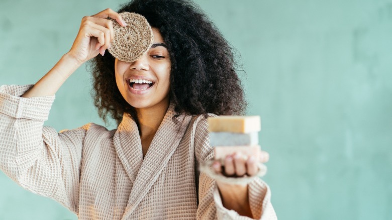Woman holding soap bars