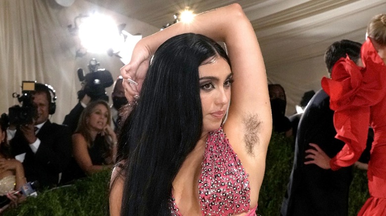 Lourdes Leon posing with her arm up to show her armpit hair at the 2021 Met Gala red carpet