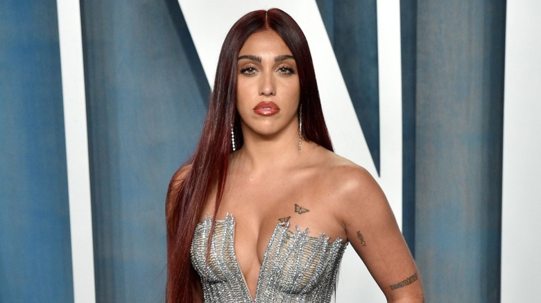 Lourdes Leon posing in a strapless dress on the 2022 Vanity Fair Oscar Party red carpet
