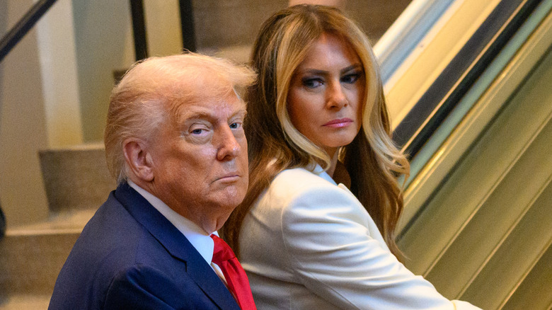 Donald Trump and Melania on an escalator at the UN, September 2025