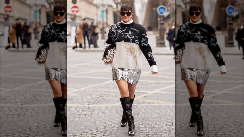 A woman in a sequin skirt 
