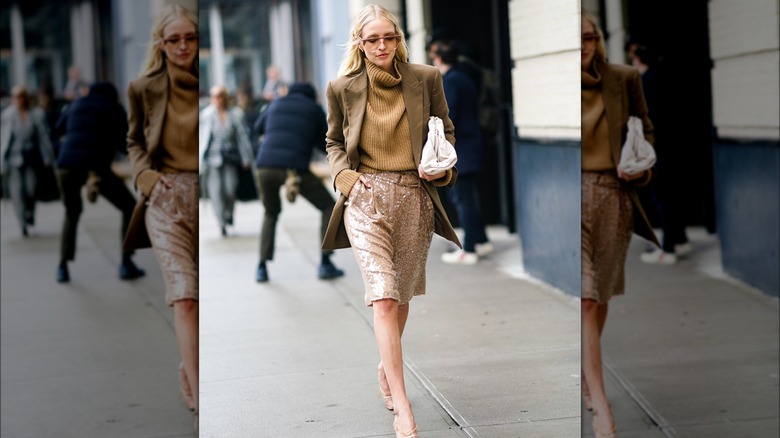 A woman in nude sequins 