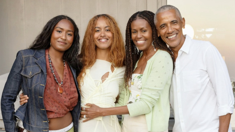 Obama family photo where Malia is showcasing copper hair