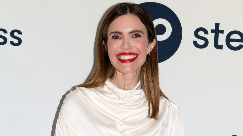 Mandy Moore in a white top at an event